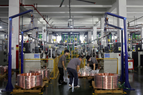 China’s factory activity expected to shrink for ninth month: Reuters poll