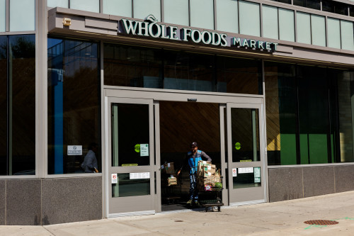 Amazon to convert select physical stores into Whole Foods, expand same-day delivery